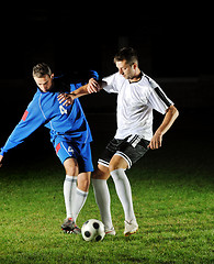 Image showing football players in action for the ball