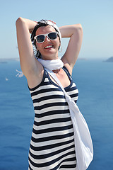 Image showing Greek woman on the streets of Oia, Santorini, Greece