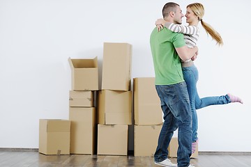 Image showing Young couple moving in new house