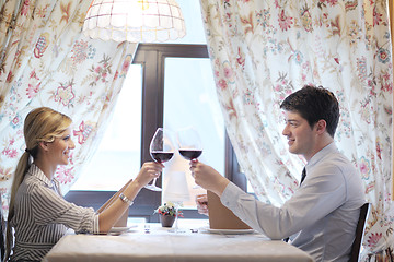 Image showing young couple having dinner at a restaurant