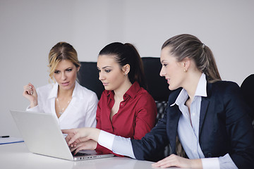 Image showing business woman group with headphones