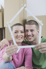 Image showing Young couple moving in new home