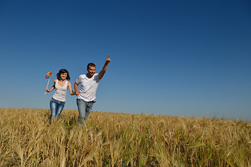 Image showing happy couple in wheat field