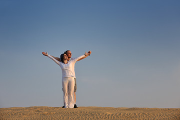 Image showing couple enjoying the sunset