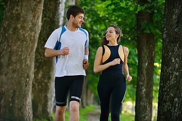 Image showing Young couple jogging