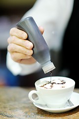 Image showing Barista prepares cappuccino