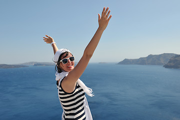 Image showing Greek woman on the streets of Oia, Santorini, Greece