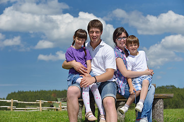 Image showing happy young family have fun outdoors