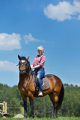 Image showing happy woman  on  horse