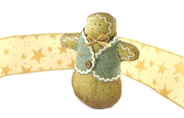 Image showing Gingerbread man and ribbon