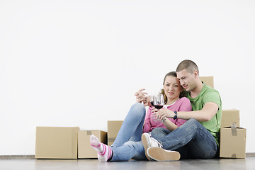 Image showing Young couple moving in new home