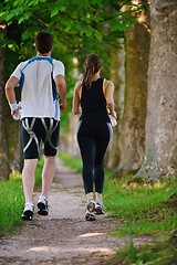 Image showing Young couple jogging