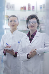 Image showing team of pharmacist chemist woman  in pharmacy drugstore