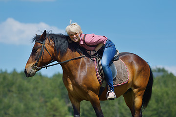 Image showing happy woman  on  horse