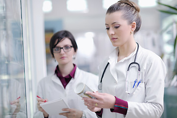 Image showing team of pharmacist chemist woman  in pharmacy drugstore