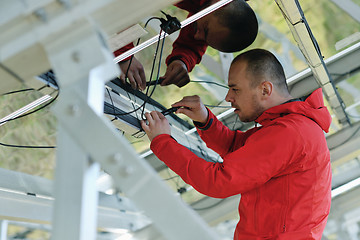 Image showing Male solar panel engineer at work place