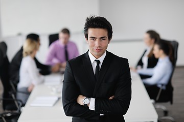 Image showing young business man at meeting