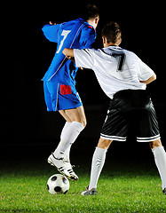 Image showing football players in action for the ball