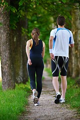 Image showing Young couple jogging