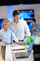 Image showing Young couple in consumer electronics store