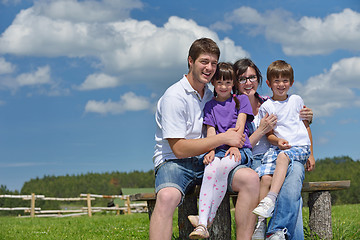 Image showing happy young family have fun outdoors