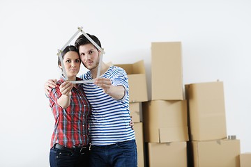 Image showing Young couple moving in new house