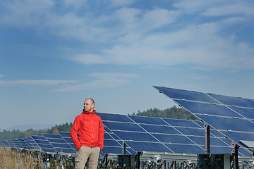 Image showing Male solar panel engineer at work place