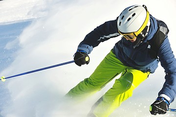 Image showing skiing on fresh snow at winter season at beautiful sunny day