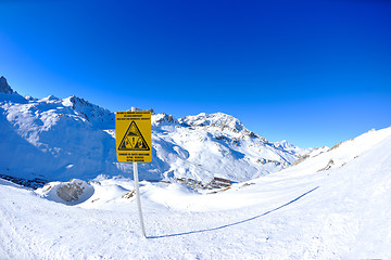 Image showing Sign board at High mountains under snow in the winter