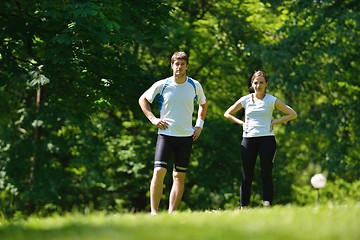 Image showing Young couple jogging