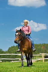 Image showing happy woman  ride  horse