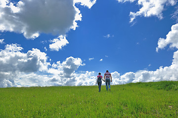 Image showing Portrait of romantic young couple smiling together outdoor