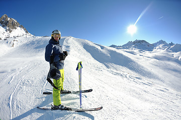 Image showing skiing on fresh snow at winter season at beautiful sunny day