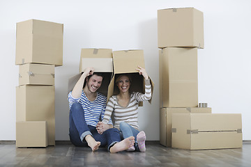 Image showing Young couple moving in new home