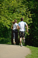 Image showing Young couple jogging at morning