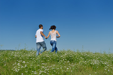 Image showing happy couple in wheat field