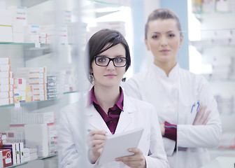 Image showing team of pharmacist chemist woman  in pharmacy drugstore