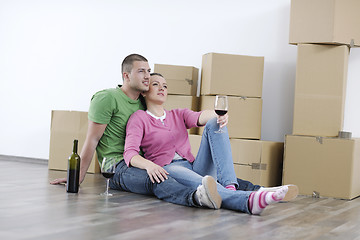 Image showing Young couple moving in new home