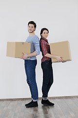 Image showing Young couple moving in new home