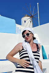 Image showing Greek woman on the streets of Oia, Santorini, Greece