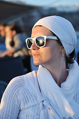 Image showing Greek woman on the streets of Oia, Santorini, Greece