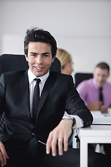 Image showing young business man at meeting