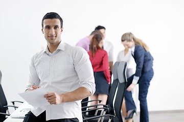 Image showing young business man at meeting