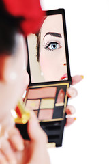 Image showing beautiful young woman applying makeup