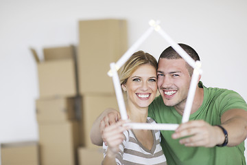 Image showing Young couple moving in new home