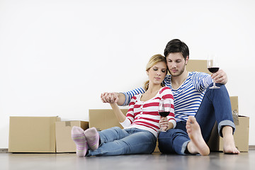 Image showing Young couple moving in new home