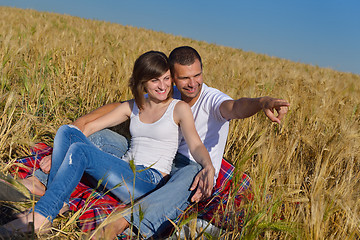 Image showing happy couple in wheat field