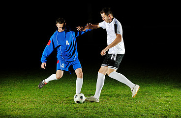 Image showing football players in action for the ball