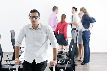 Image showing young business man at meeting