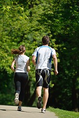 Image showing Young couple jogging at morning